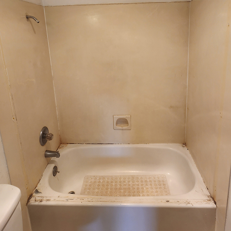 before reglazed surface dirty tub